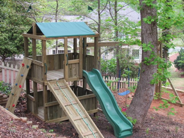 4x6 model as shown $1750.00 including Wooden Ramp with Rope, Rock Climbing Wall, and Swings