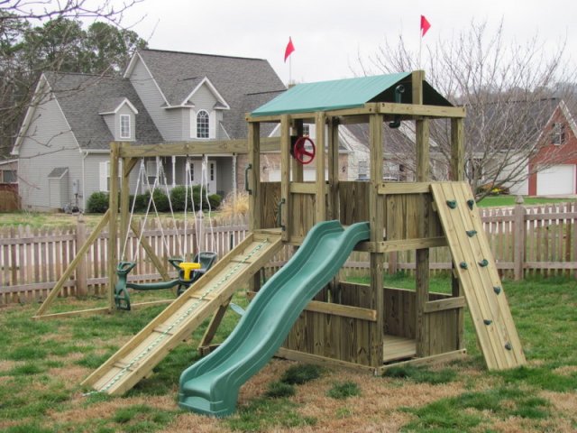 4x6 model as shown $1825.00 including Wooden Ramp with Rope, Rock Climbing Wall, Swing, Childseat, and Glider Horse