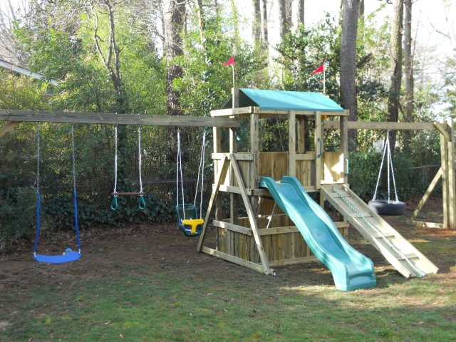 4x6 model as shown $1850.00 including Wooden Ramp with Rope, Childseat,Swing, Trapeze Bar with Rings, and Tire Swing