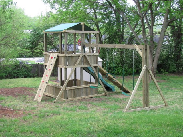 6x6 model as shown $2275.00including HOP"s UPgrade, Wooden Ramp with Rope, Red Rock Climbing Wall, Soft Grip Swings, and Traepze Bar