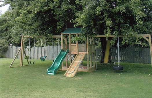 4x6 model as shown $1775.00 Wooden Ramp with Rope, Tire Swing,swings,childseat,Green Rock Climbing Walls, and Fireman's Pole