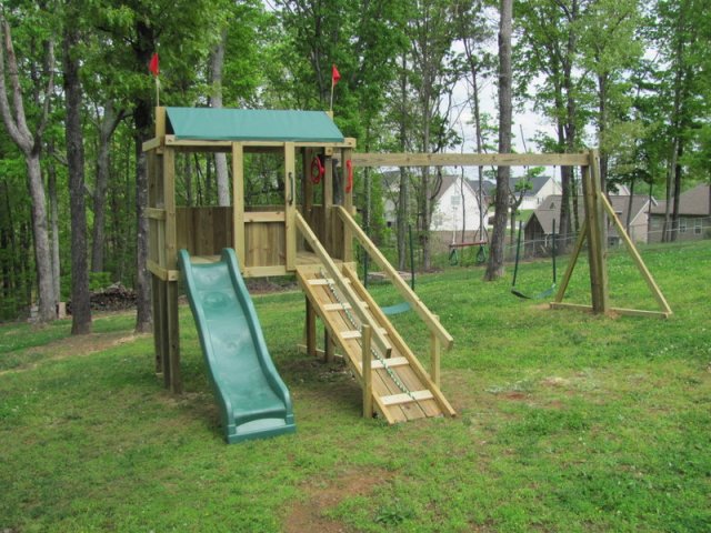 4x6 model as shown $1325.00 Wooden Ramp with Handrails, 2 Swings, and Trapeze Bar with Rings